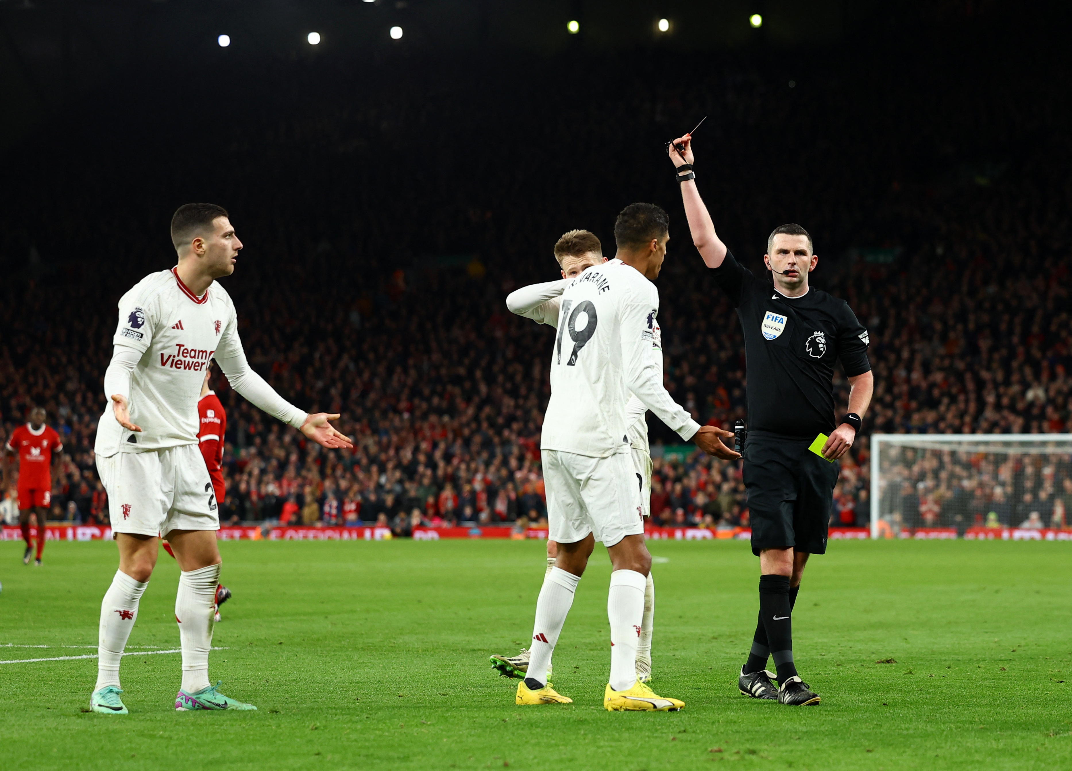 Diogo Dalot was sent off as Michael Oliver gave him two yellow cards for dissent