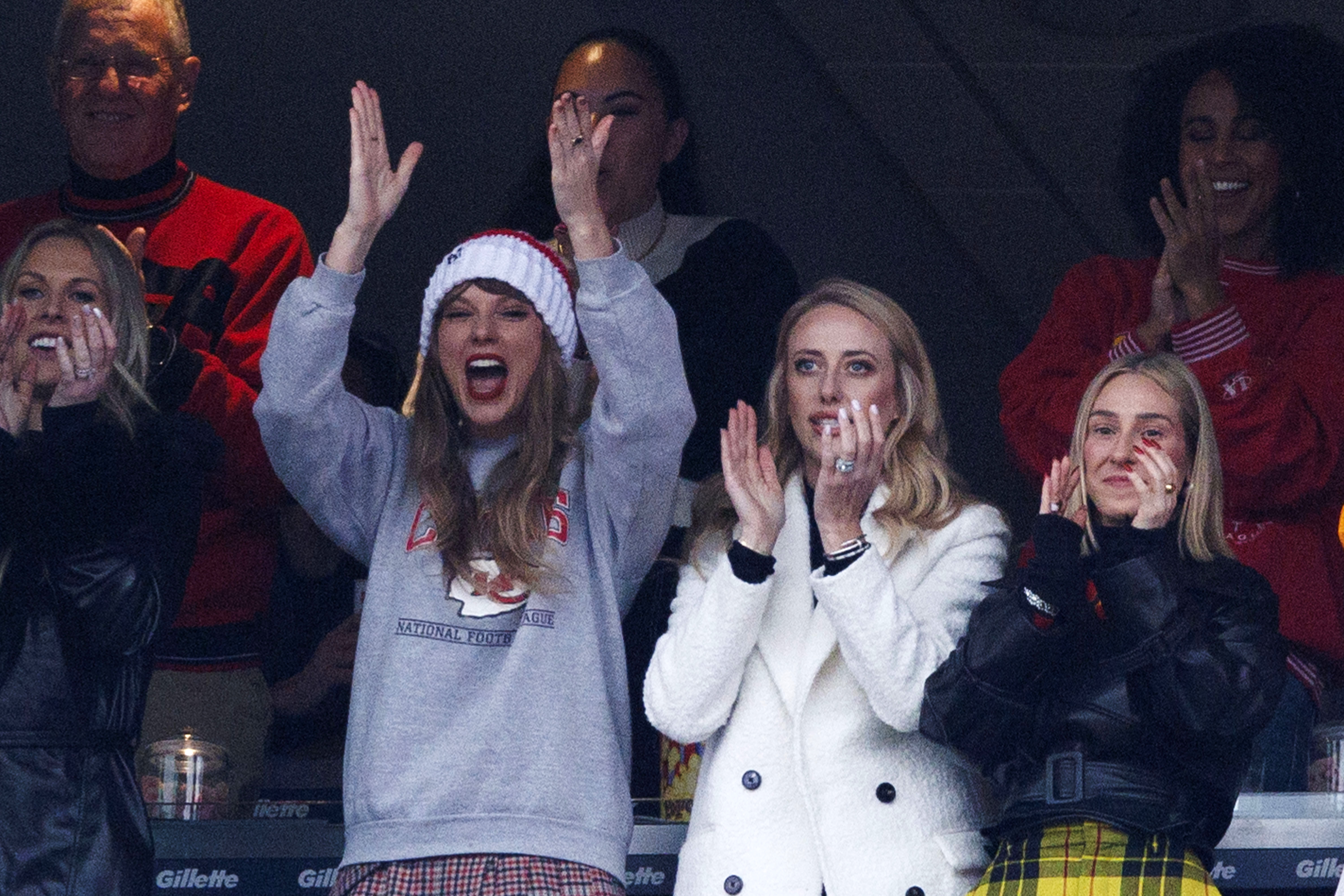 Taylor Swift and father Scott and friends at football game