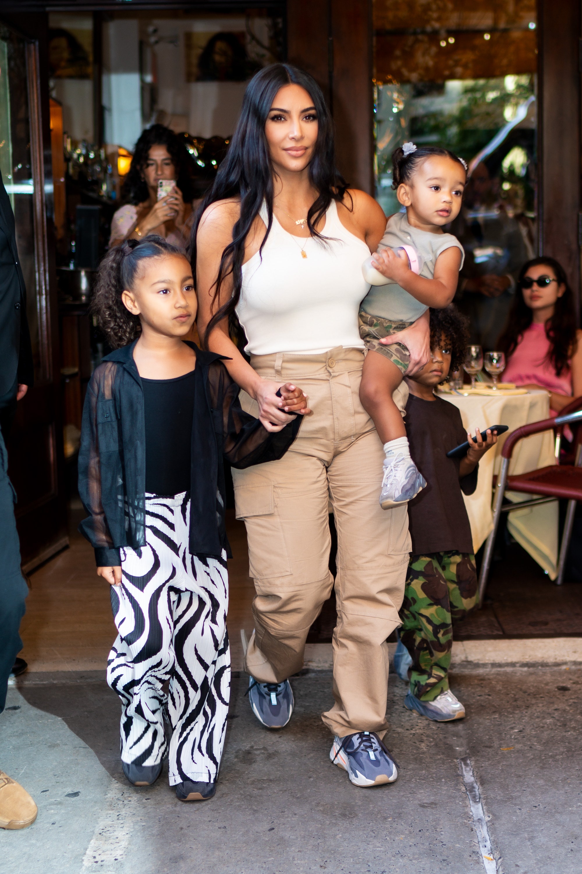 Here's Why Kim Kardashian Says Her Kids 'Probably Hate Me' | Glamour