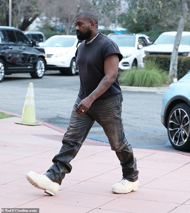 Kanye West was spotted arriving in a car with a '666' license plate to his son's basketball game on Friday