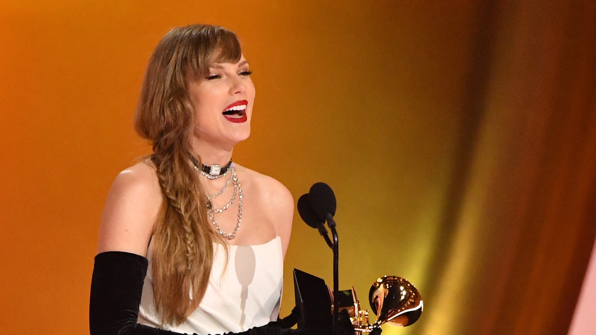 US singersongwriter Taylor Swift accepts the Best Pop Vocal Album award for Midnights on stage during the 66th Annual...