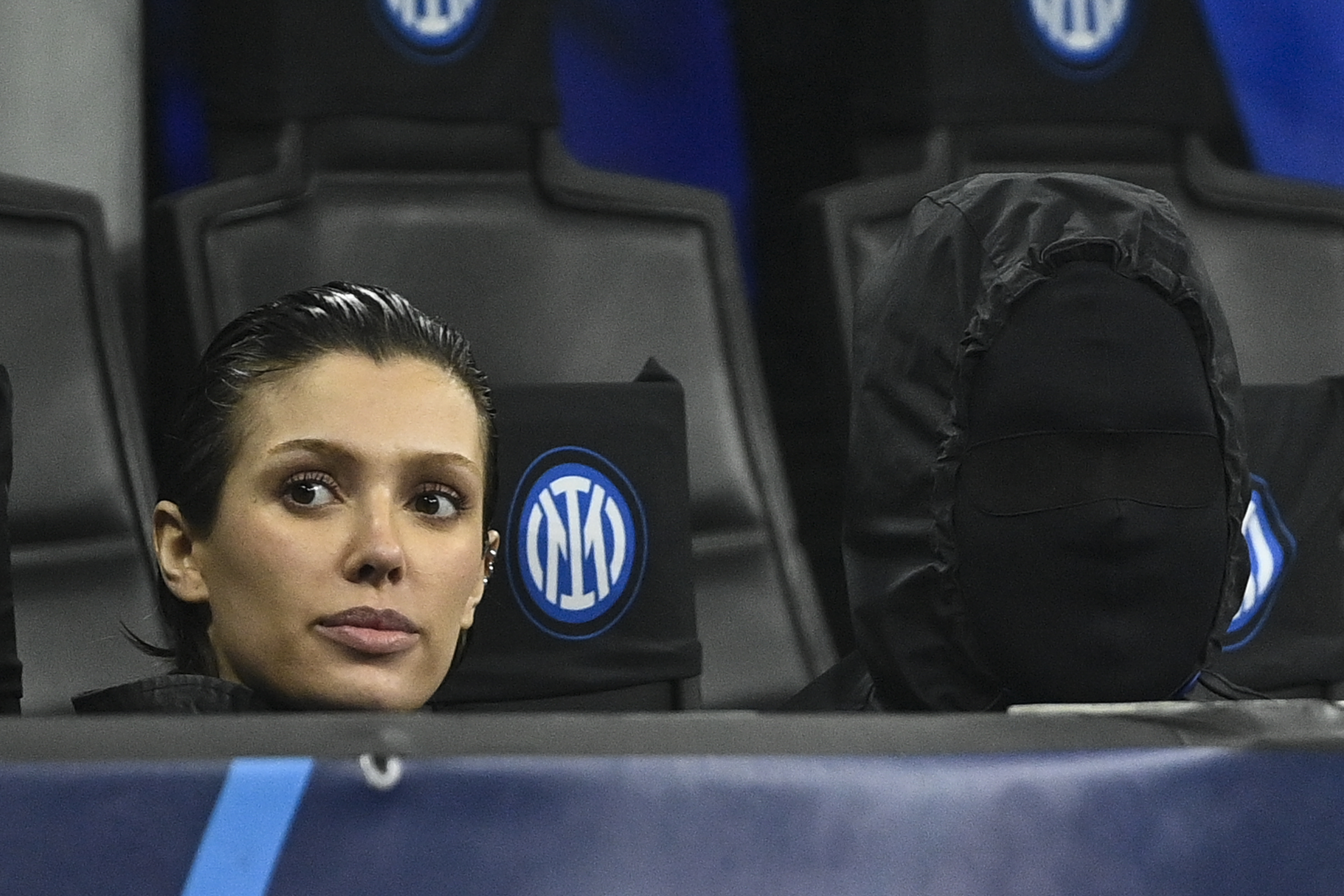 Kanye West, right, and Bianca Censori were at the San Siro to watch the Champions League action