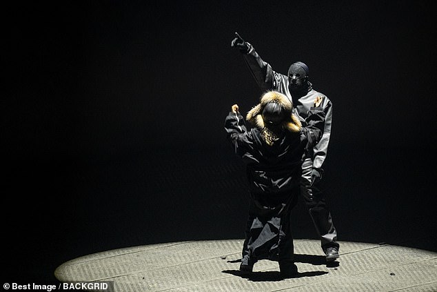 Kanye West sports Halloween-style hockey mask on stage with daughter North,  10, as she is named as one of the youngest Billboard stars ever amid claims  he couldn't get a gig for