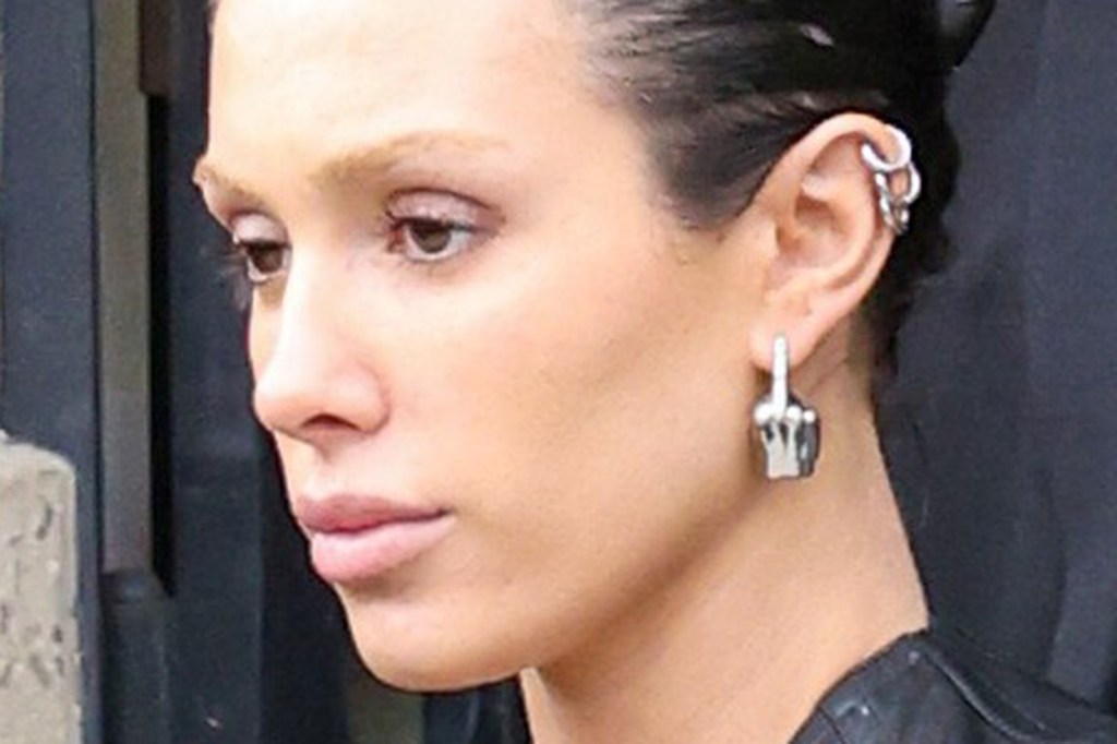 Bianca Censori wearing middle finger earrings