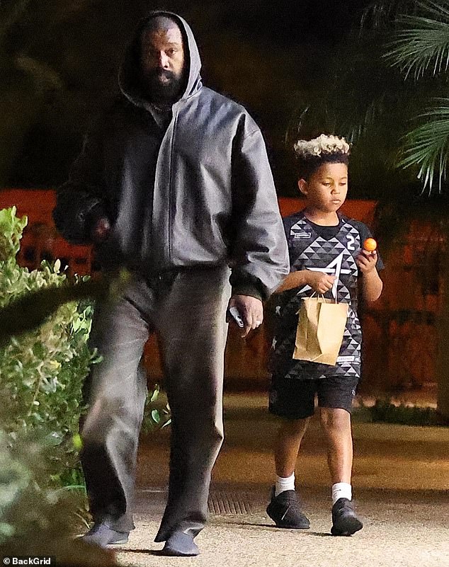 Kanye West has some one-on-one time with son Saint, eight, as he takes the  young athlete out for a treat after his basketball game | Daily Mail Online