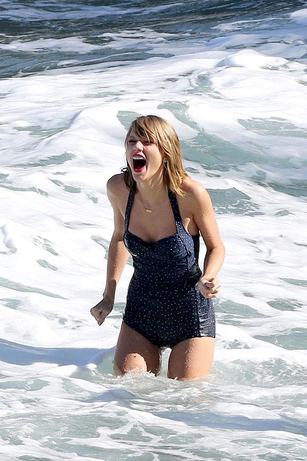 Taylor Swift Poses Adorably For Paparazzi Wearing Cute Retro Swimsuit In Hawaii—See The Pics!