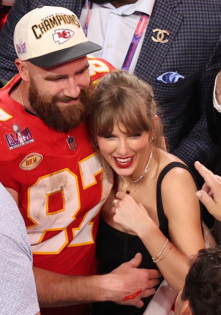 Travis Kelce and Taylor Swift hugging after his 2024 Super Bowl win