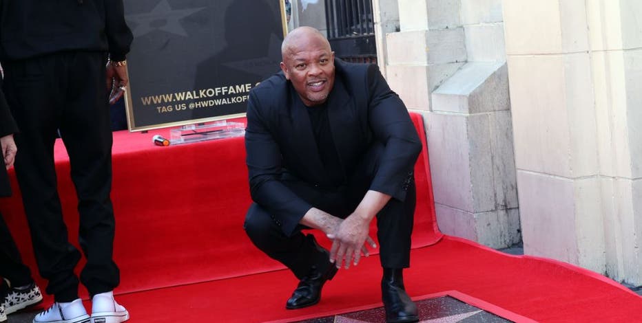 Dr. Dre honored with Hollywood Walk of Fame star surrounded by hip-hop  royalty
