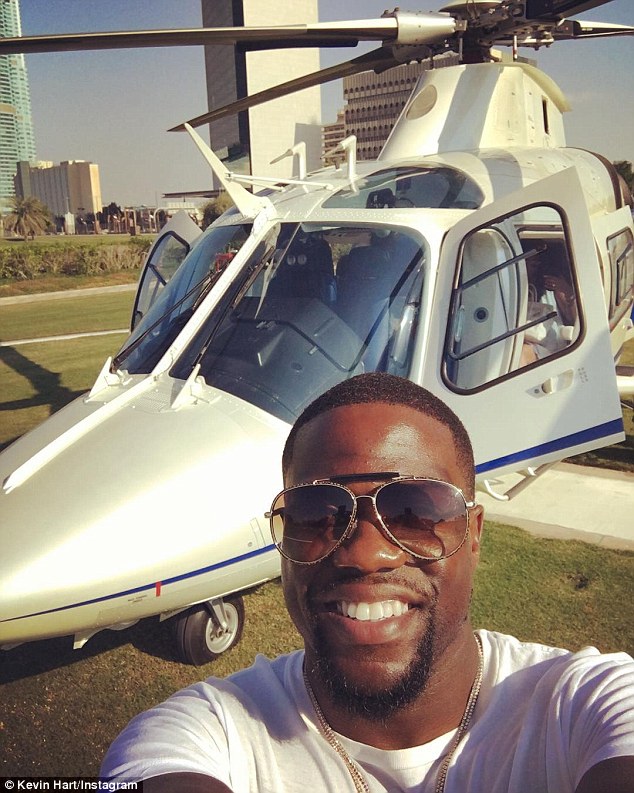 Kevin Hart feeds lion and tiger on couples' trip to Dubai with Ludacris |  Daily Mail Online