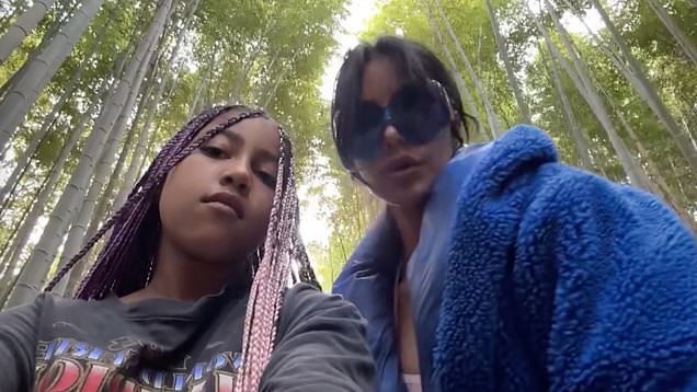 Kim Kardashian and daughter North West, 9, share kiss while walking through bamboo forest | Daily Mail Online