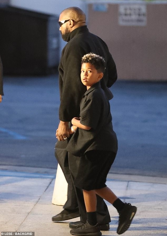 The rapper held hands with his adorable son Saint