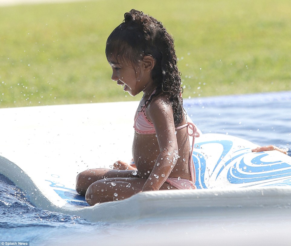 Kim Kardashian has some pooltime fun with North and Saint | Daily Mail  Online