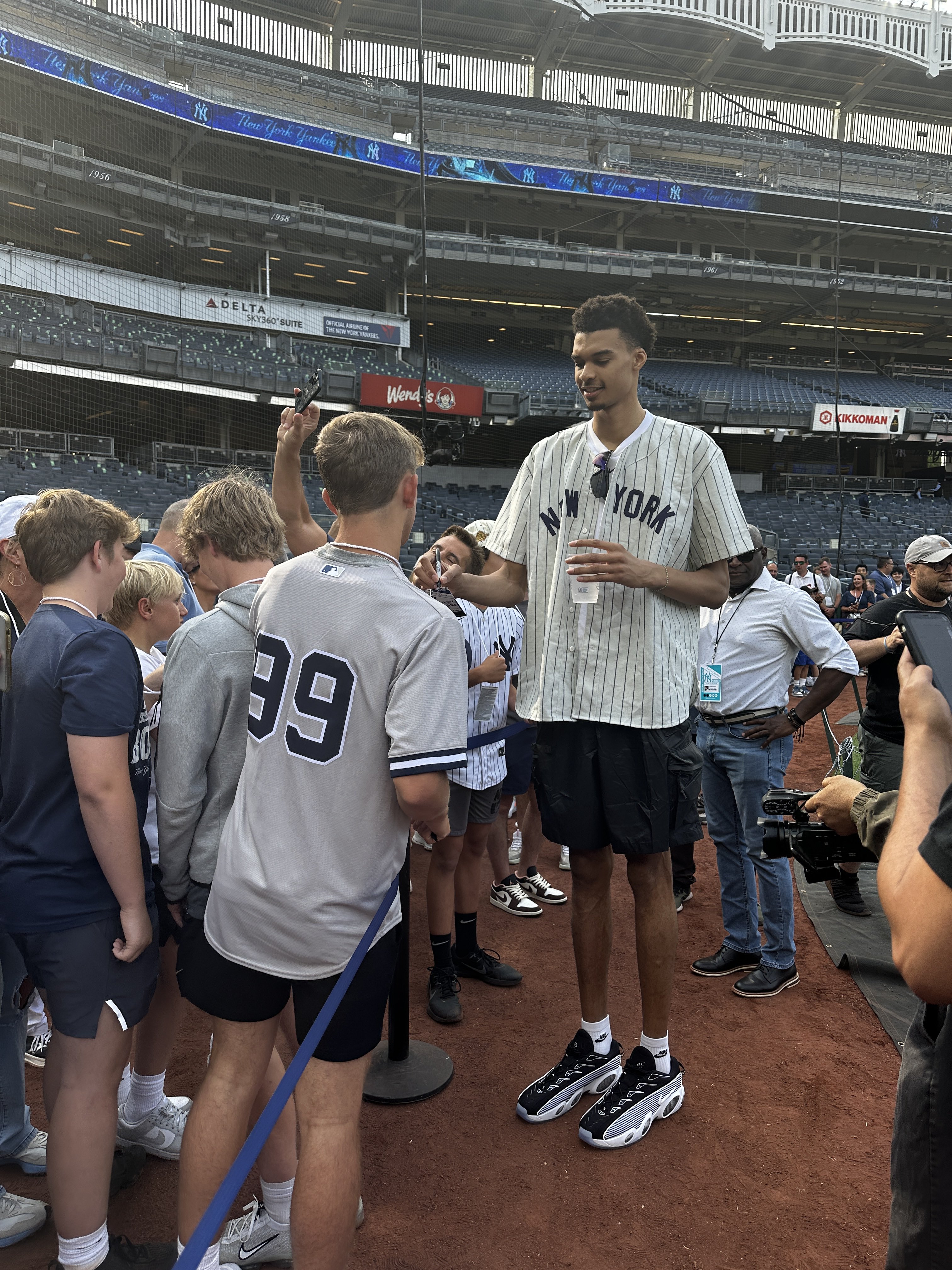 Joon Lee on X: "Victor Wembanyama is at Yankee Stadium, and he's tall  https://t.co/u1N1WX493d" / X