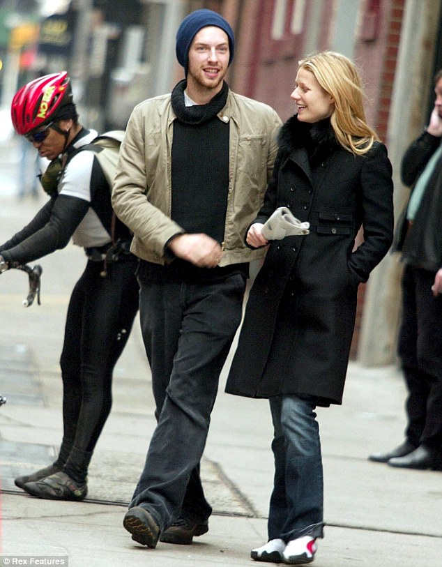 Chalk and cheese: Chris and Gwyneth, pictured in February 2003, reportedly acted very different towards their neighbours with the former being always happy to chat