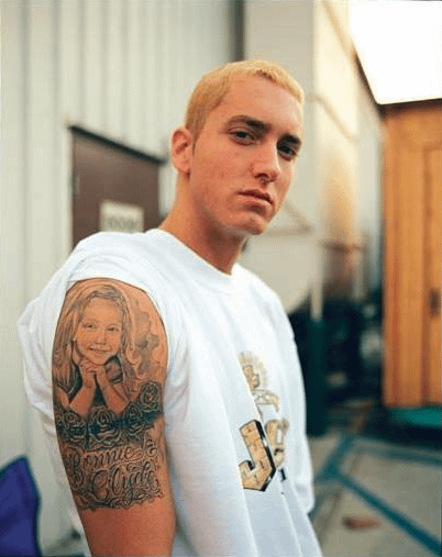 Rare pic of Eminem right after getting his Hailie portrait tattoo : r/Eminem