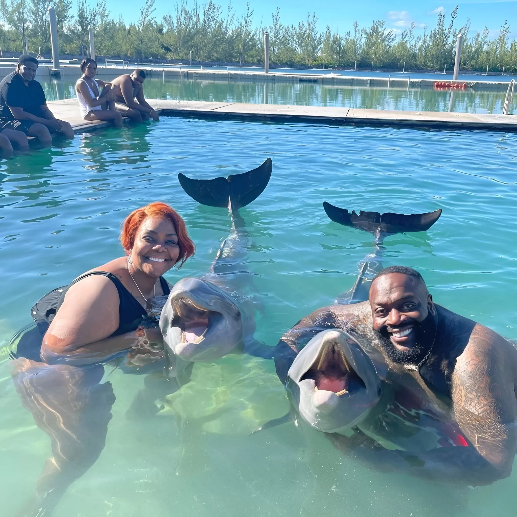 Rick Ross Elevates Family Bonding: A Luxurious Getaway to the Bahamas on a  Private Jet for a Day of Dolphin Delight