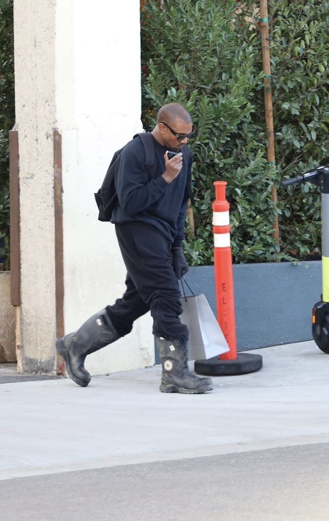 Kanye West leaving the SoHo Warehouse in Los Angeles on Jan. 14. - Credit: Khrome / SplashNews.com