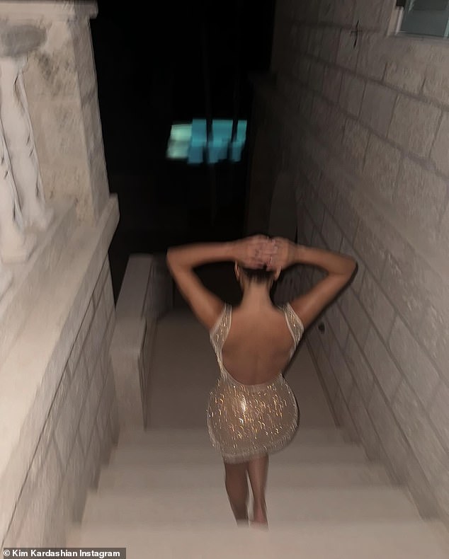 While sharing a slew of envy-inducing snaps of herself in a plunging gold minidress from their luxurious trip, the reality star, 43, credited her eldest child for capturing the moment