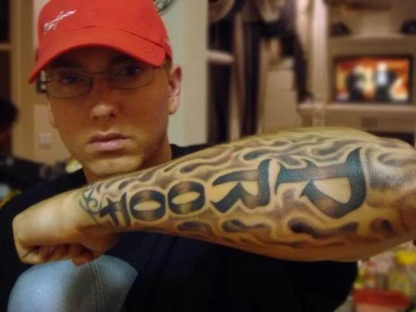 without me on X: "Left Forearm Backside Tattoo : “Proof” Eminem's tattoo  inside the left forearm in memory of his late best friend and fellow  rapper, DeShaun Dupree Holton aka Proof of