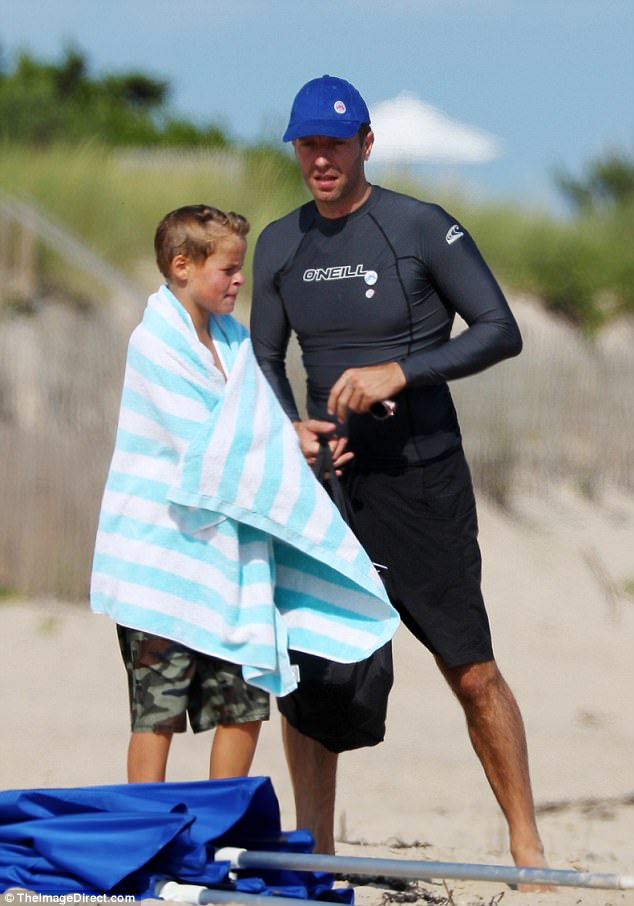 Chris Martin enjoys surfing with son Moses in Hamptons | Daily Mail Online