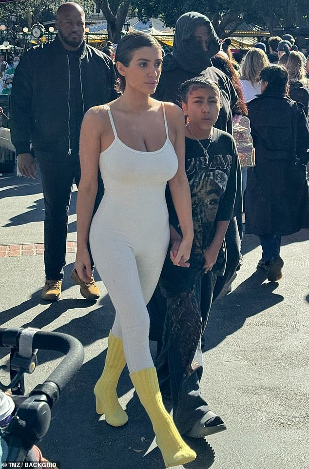 Kanye West's wife Bianca wears a leotard to Disneyland while holding hands  with North... after rapper courted controversy with offensive KKK-style  hood | Daily Mail Online