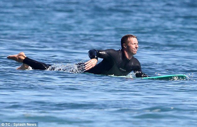 Chris-Martin-Coldplay-surfing - North Coast Wetsuits - NCW