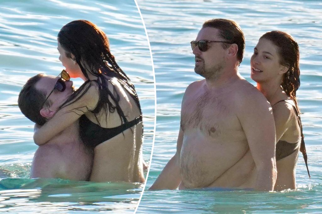 Leonardo DiCaprio and Camila Morrone splash around in the ocean