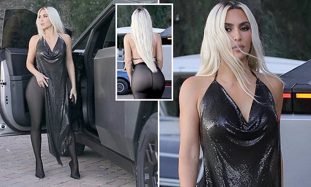 Kim Kardashian shows off her curves and continues to plug controversial $60k  Cybertruck - as the Tesla vehicle is plagued with safety problems | Daily  Mail Online