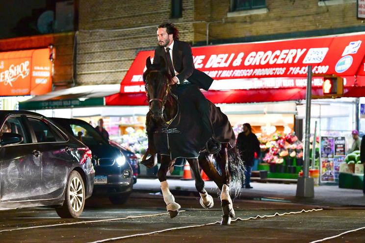 NEW YORK, NY - JULY 14: Keanu Reeves seen riding a horse on location for 'John Wick 3' in Brooklyn on July 14, 2018 in New York City. (Photo by James Devaney/GC Images)