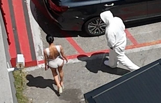 Kanye West and Bianca Censori in matching white outfits