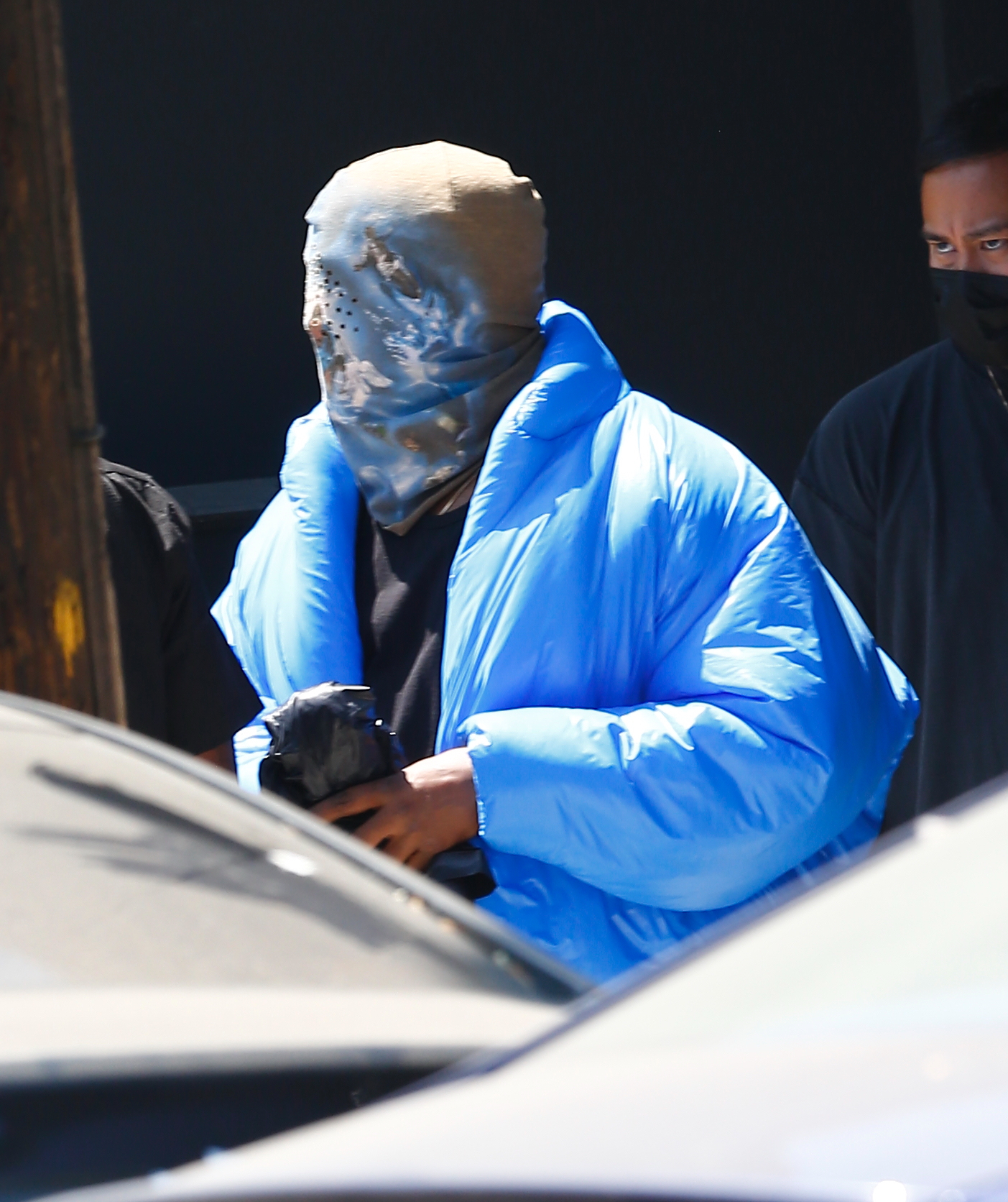 The rapper appeared to be trying to keep a low profile in his full face mask