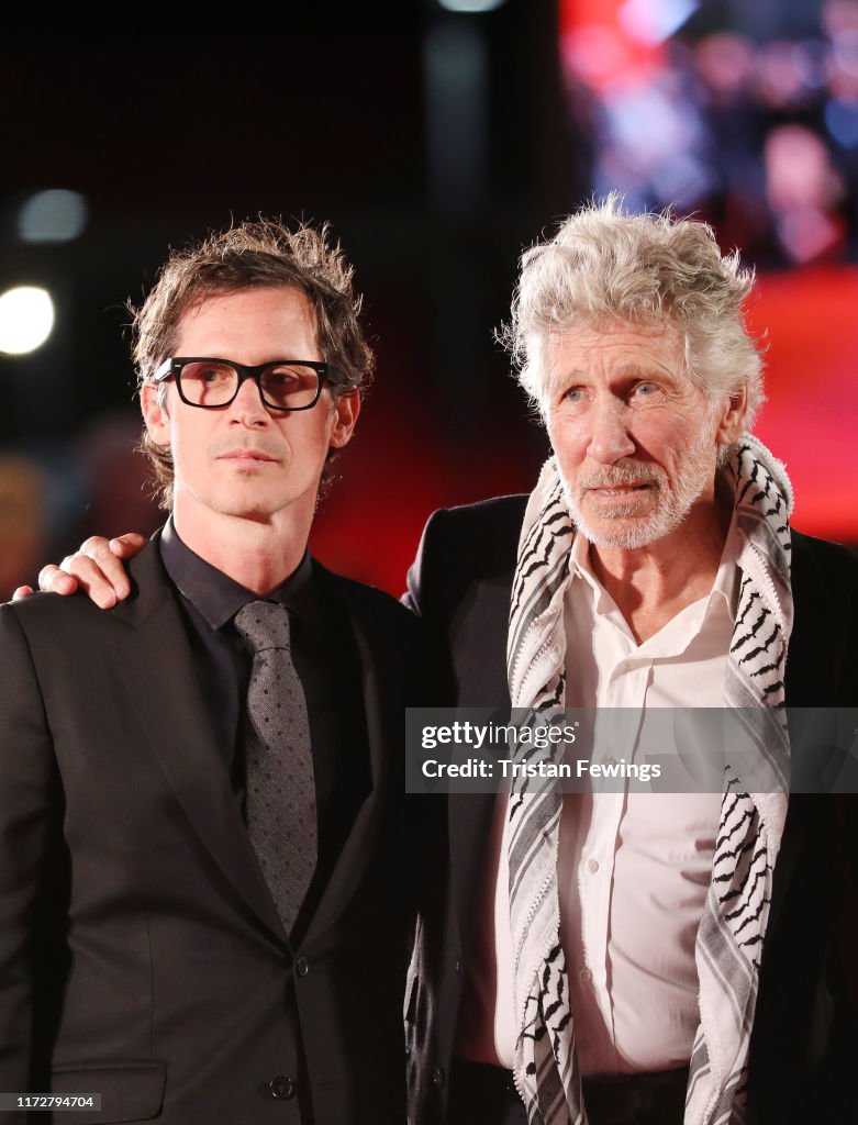 Sean Evans and Roger Waters walk the red carpet ahead of the "Roger... News  Photo - Getty Images