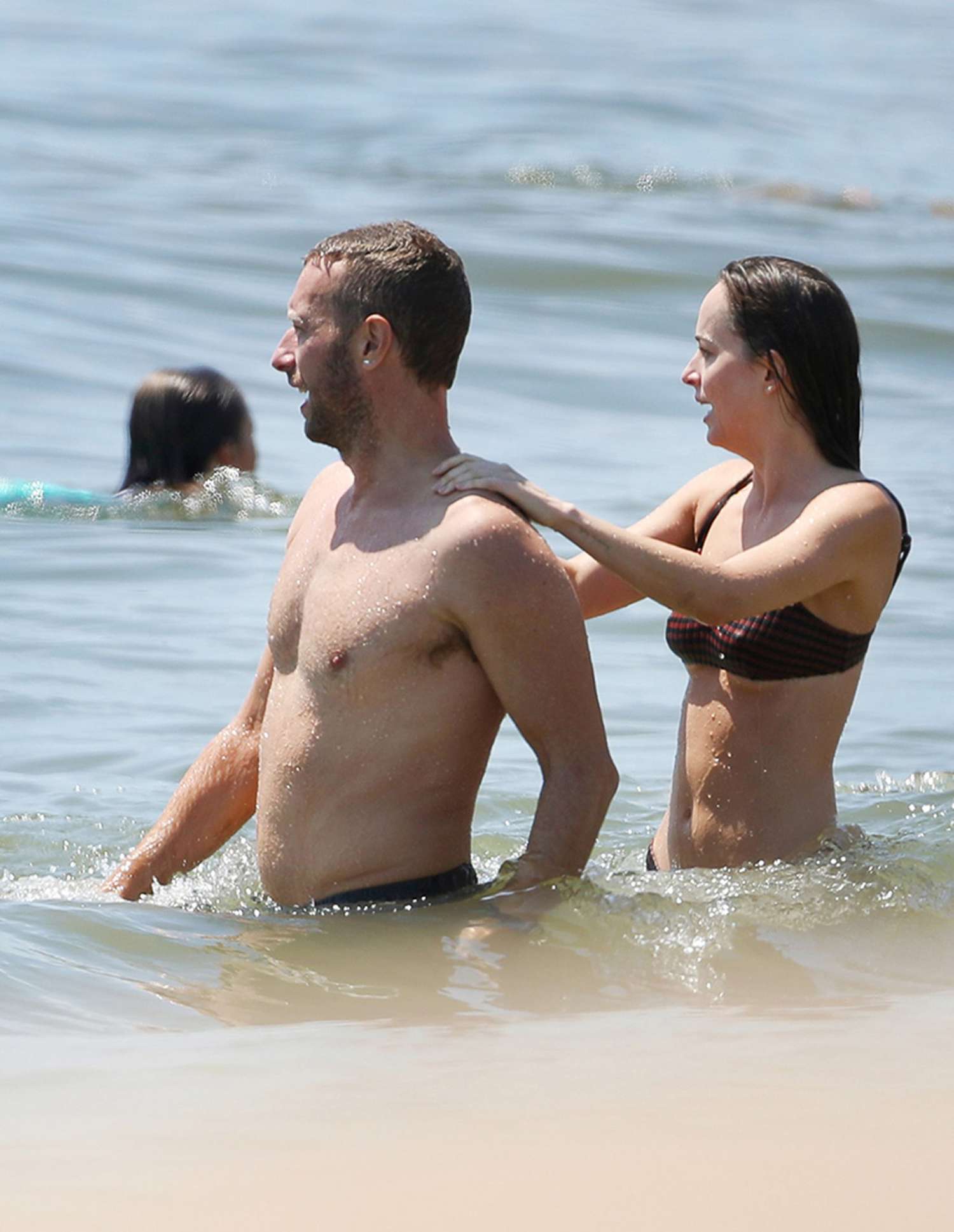 Chris Martin and Dakota Johnson Spend Time at the Beach