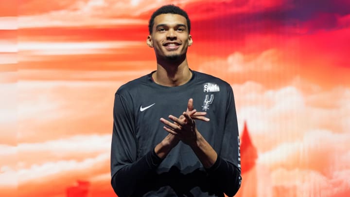 Feb 16, 2024; Indianapolis, Indiana, USA; Team Pau center Victor Wembanyama (1) of the San Antonio Spurs claps during introductions before a Rising Stars semifinal game at Gainbridge Fieldhouse.