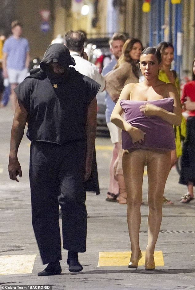 Kanye West and 'wife' Bianca Censori are LAUGHED at by onlookers in Italy  as she steps