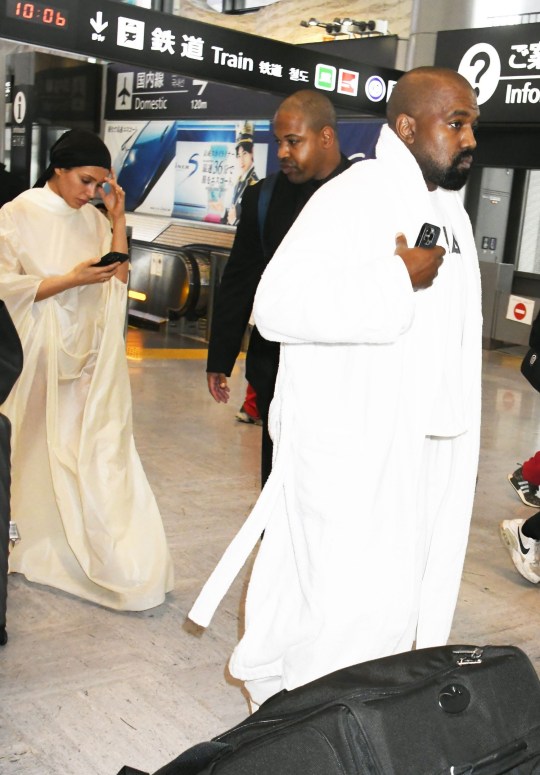 Bianca Censori and Kanye West at Narita International Airport, Japan.