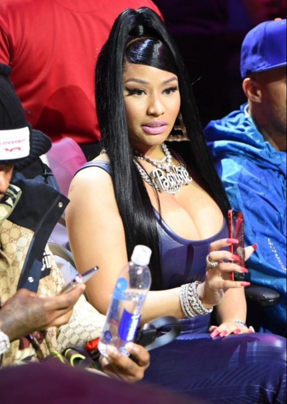 Nicki watched the game intensely