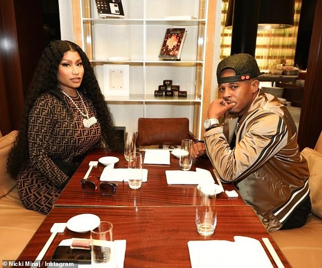 Shocking: Nicki raised eyebrows when she confirmed her romance with Kenneth - who has reportedly been slapped with two violent conduct violations in 2010 for threats and fighting