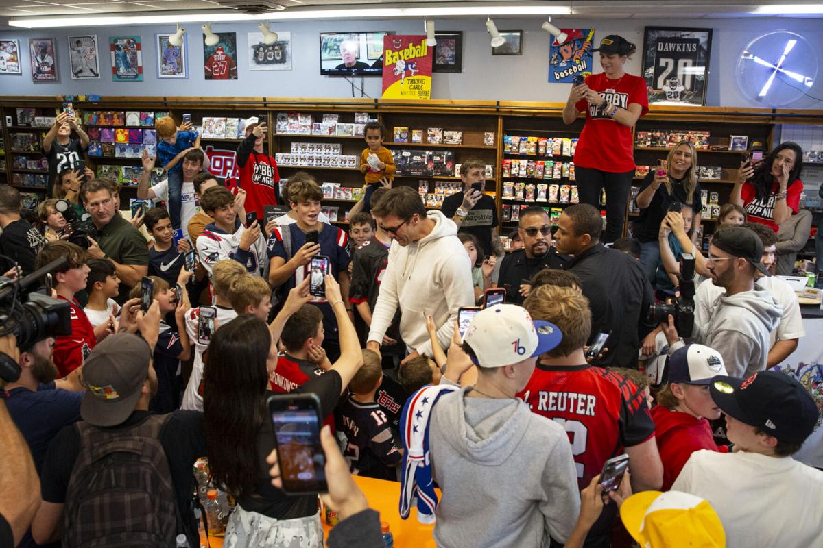 Tom Brady, Kevin Hart, Travis Scott trade cards with kids