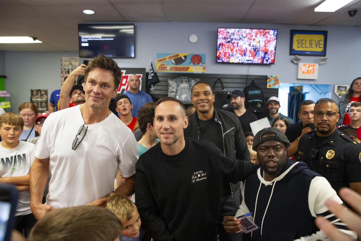 Tom Brady, Kevin Hart, Travis Scott trade cards with kids