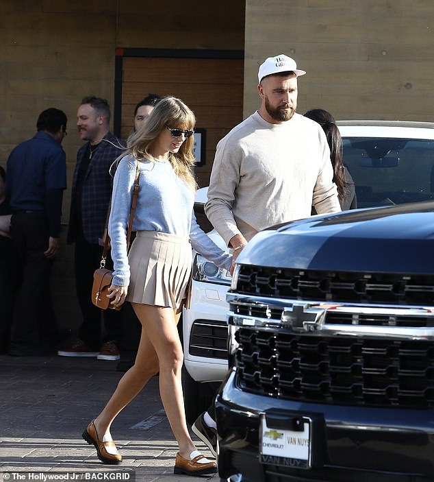 The 14-time Grammy winner completed her outfit with brown and white loafers