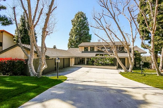 The five-bedroom, four-bathroom house is part of an affluent Los Angeles County neighborhood and features three outdoor decks, a spa and swimming pool