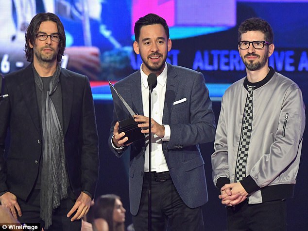 Tribute: Linkin Park's remaining members - Mike Shinoda, Rob Bourdon and Brad Delson -  honored their late lead singer Chester Bennington on Sunday night at the AMA