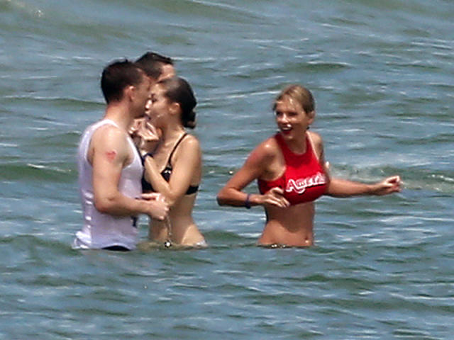 Bikini-Clad Taylor Swift Gets Very Cozy with Tom Hiddleston at Star-Studded July 4th Party