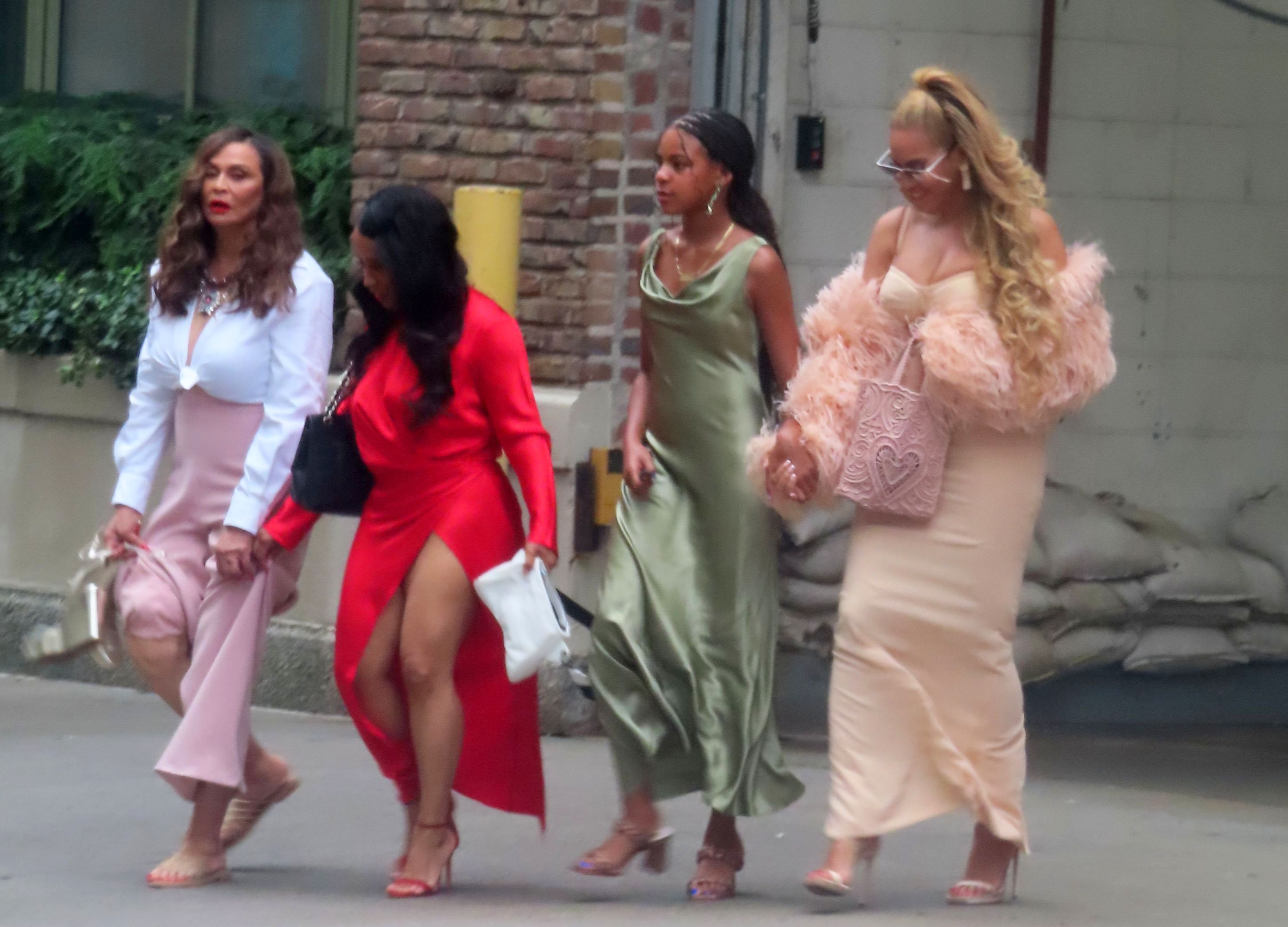 Tina Knowles walking with Beyonce and Blue Ivy