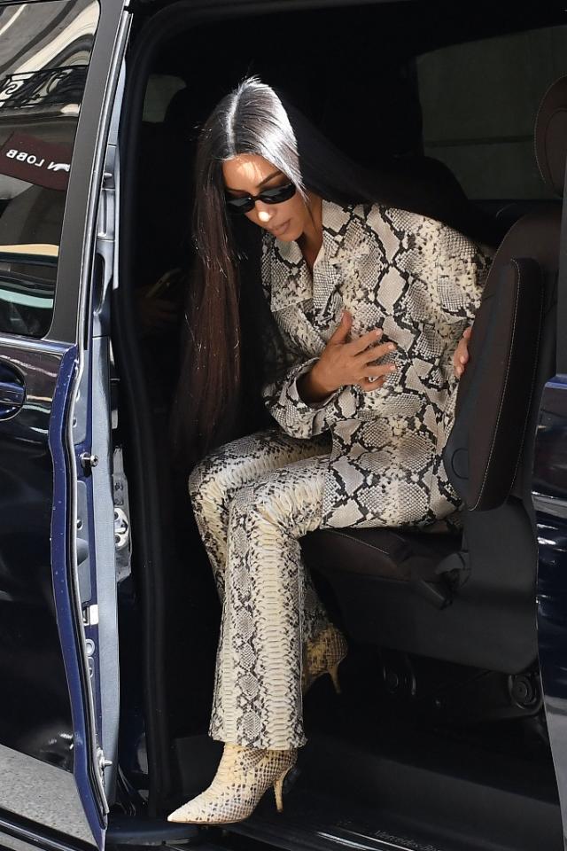 Kim Kardashian Slithers Into Paris in Head-to-Toe Snakeskin